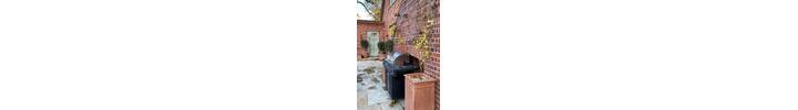 Tall, elegant square Pilone planter with leaf design