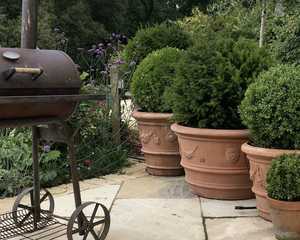 traditional barbecue with terracotta pots