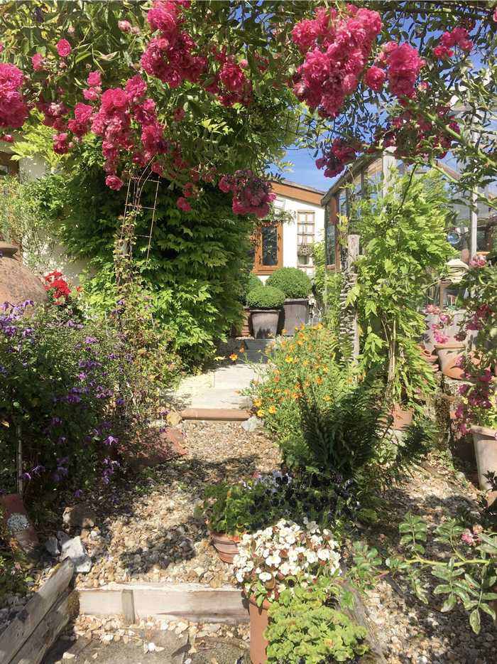 gravel path with terracotta pots