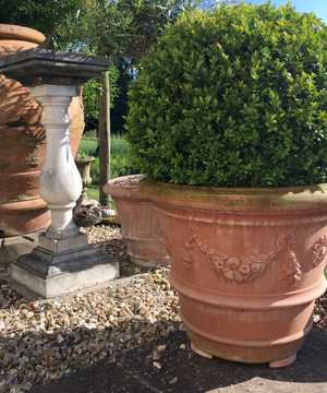 large terracotta pot on gravel 