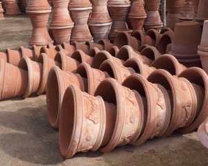 A collection of large terracotta pots
